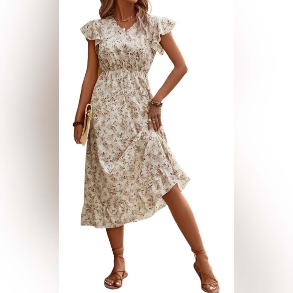 Brand new, never worn size 14 floral Boho dress.